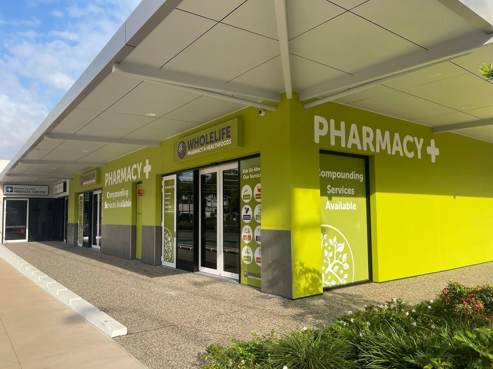 Belgian Gardens Medical Centre entrance at the left of the adjoining WholeLife pharmacy